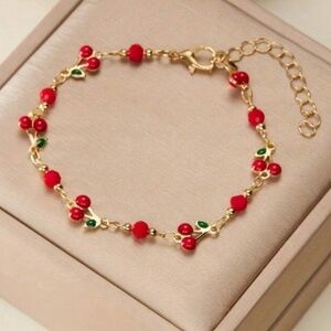 Anthropologie Red and Gold cherry Beaded Bracelet